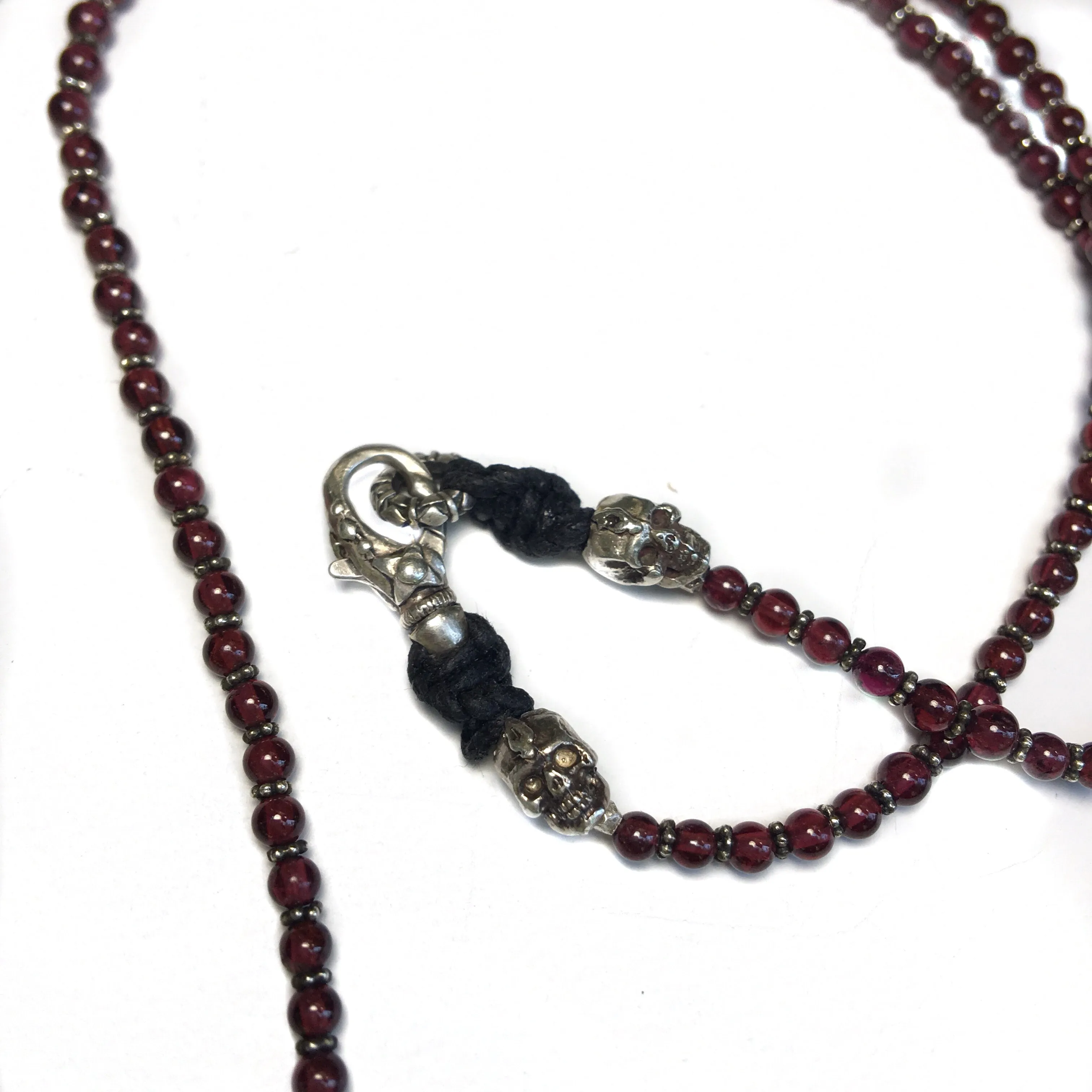 Garnet and Silver Skull Cross Necklace
