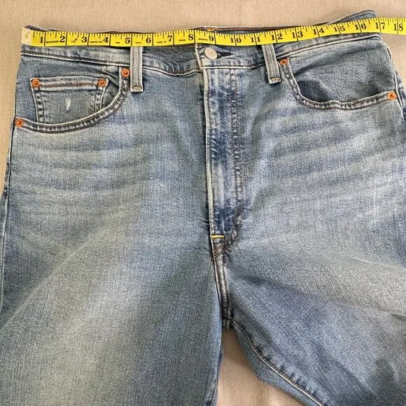 Levis Ribcage Bell blown out knee jeans