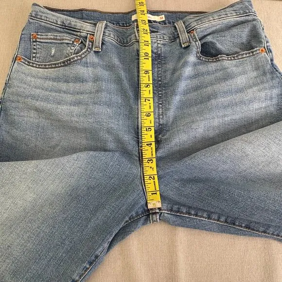 Levis Ribcage Bell blown out knee jeans