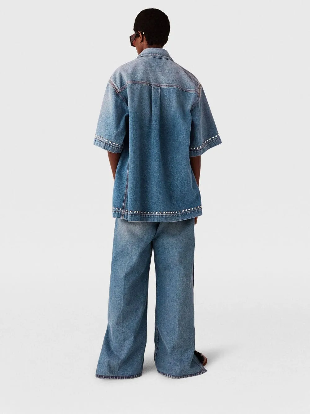 Popper-Studded Bootcut Washed Denim Jeans