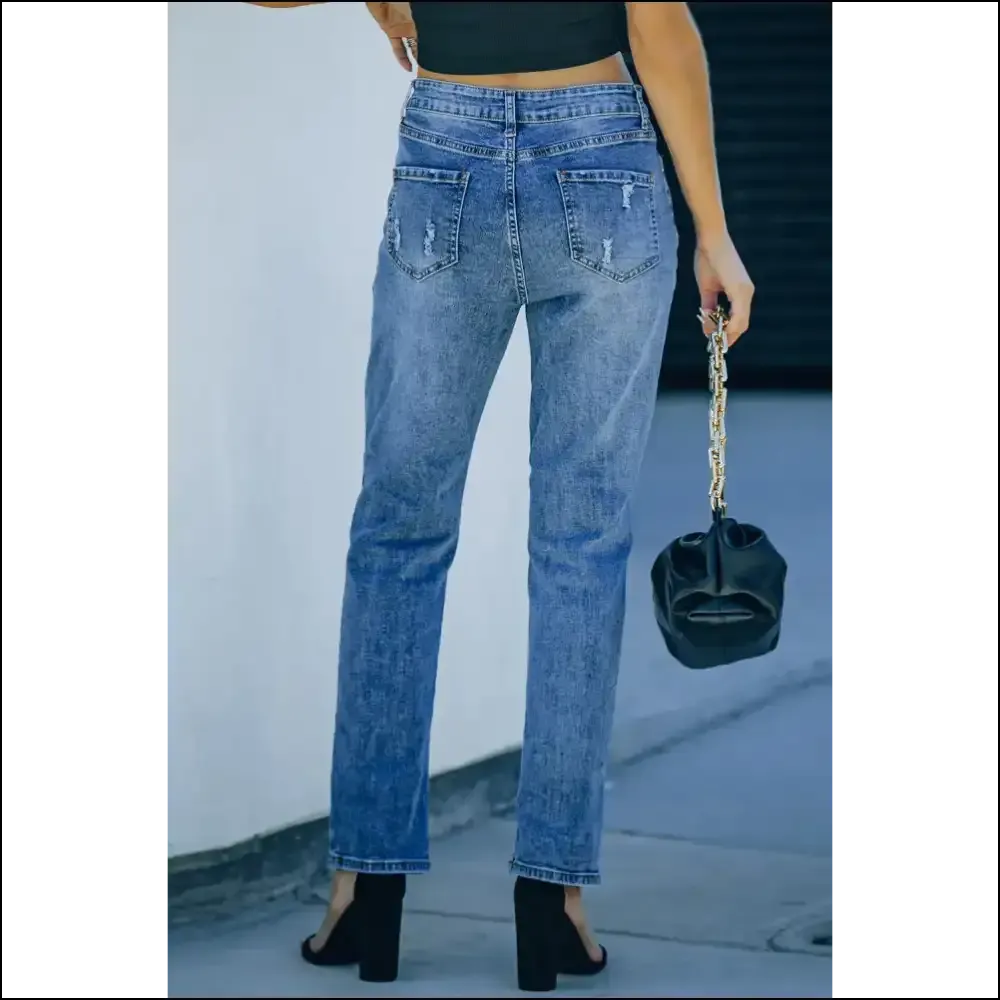 Spooktacular Style Unleashed: Distressed Pumpkin Jeans for Fashion Ghouls! 🎃👖