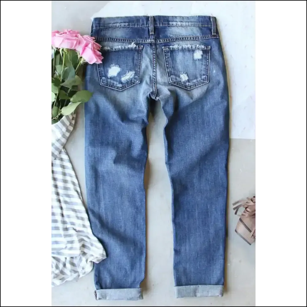 Spooktacular Style Unleashed: Distressed Pumpkin Jeans for Fashion Ghouls! 🎃👖